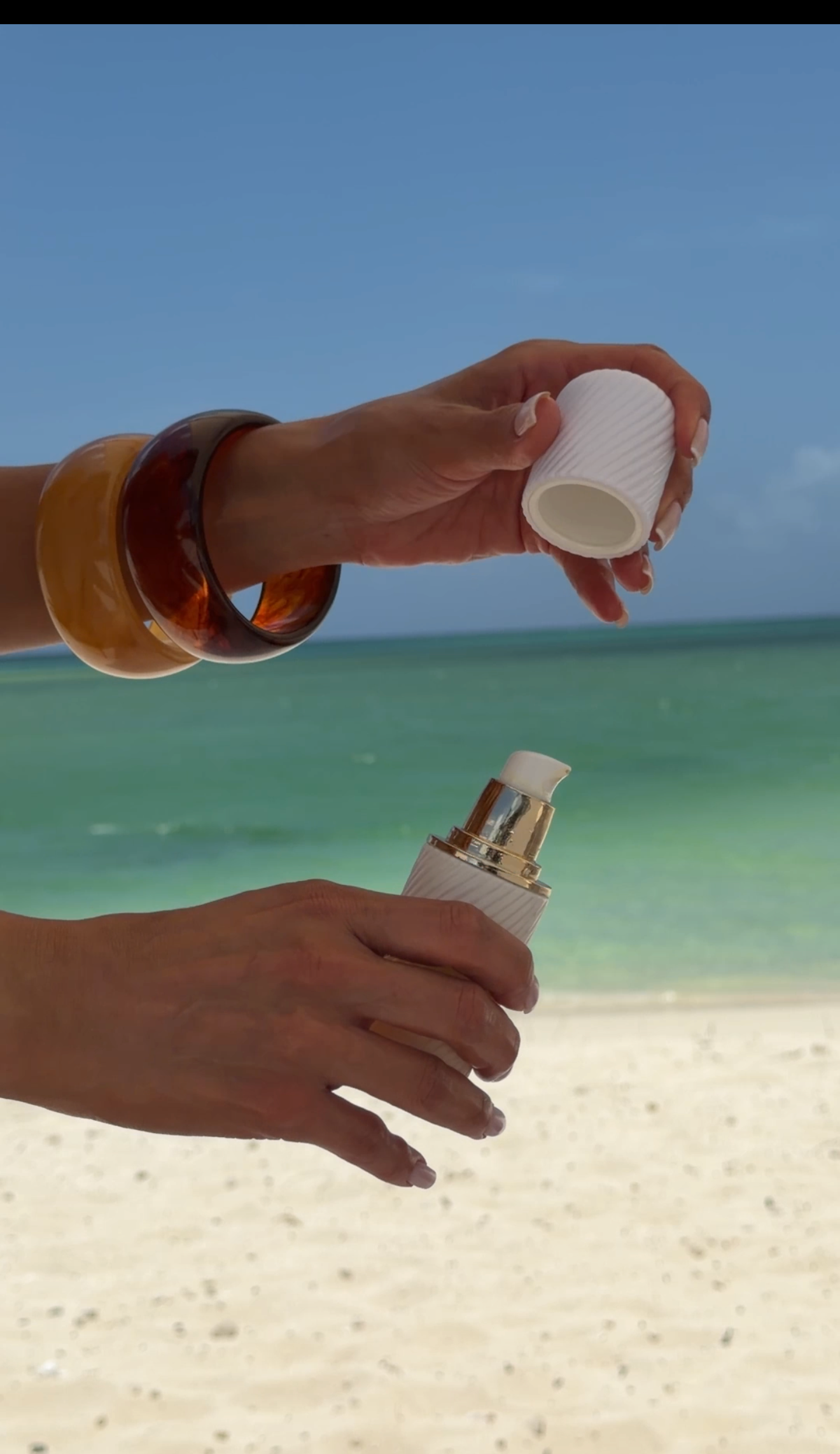 Applying Rose Veil at the beach